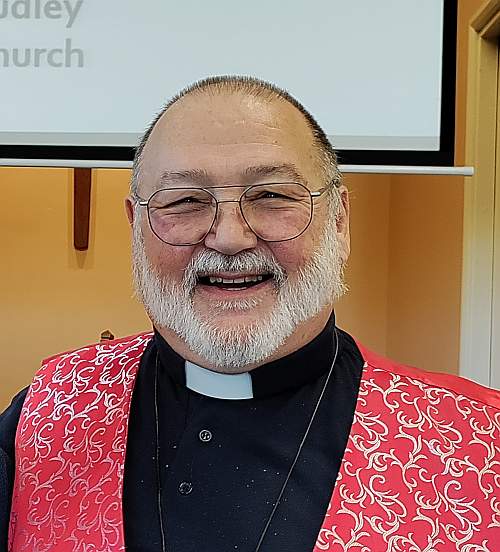 Pastor Tony Brown, smiling and happy.