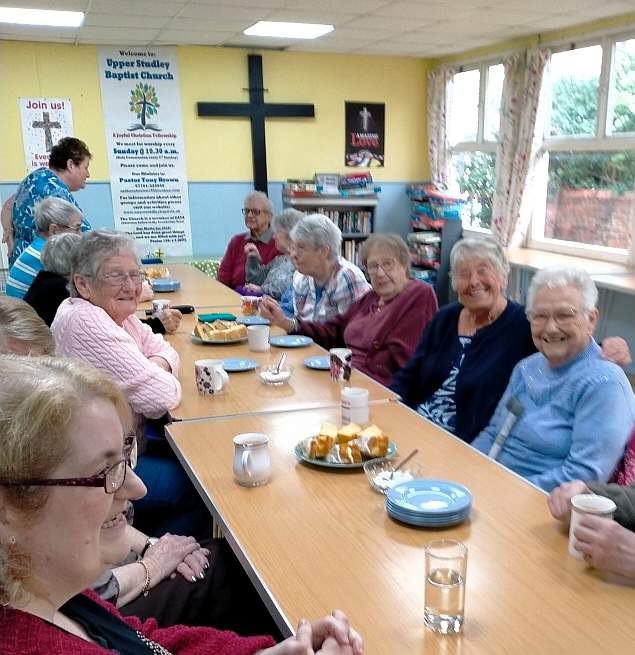 People meeting to share friendship over tea and cake at Upper Studley Baptist Church Hall